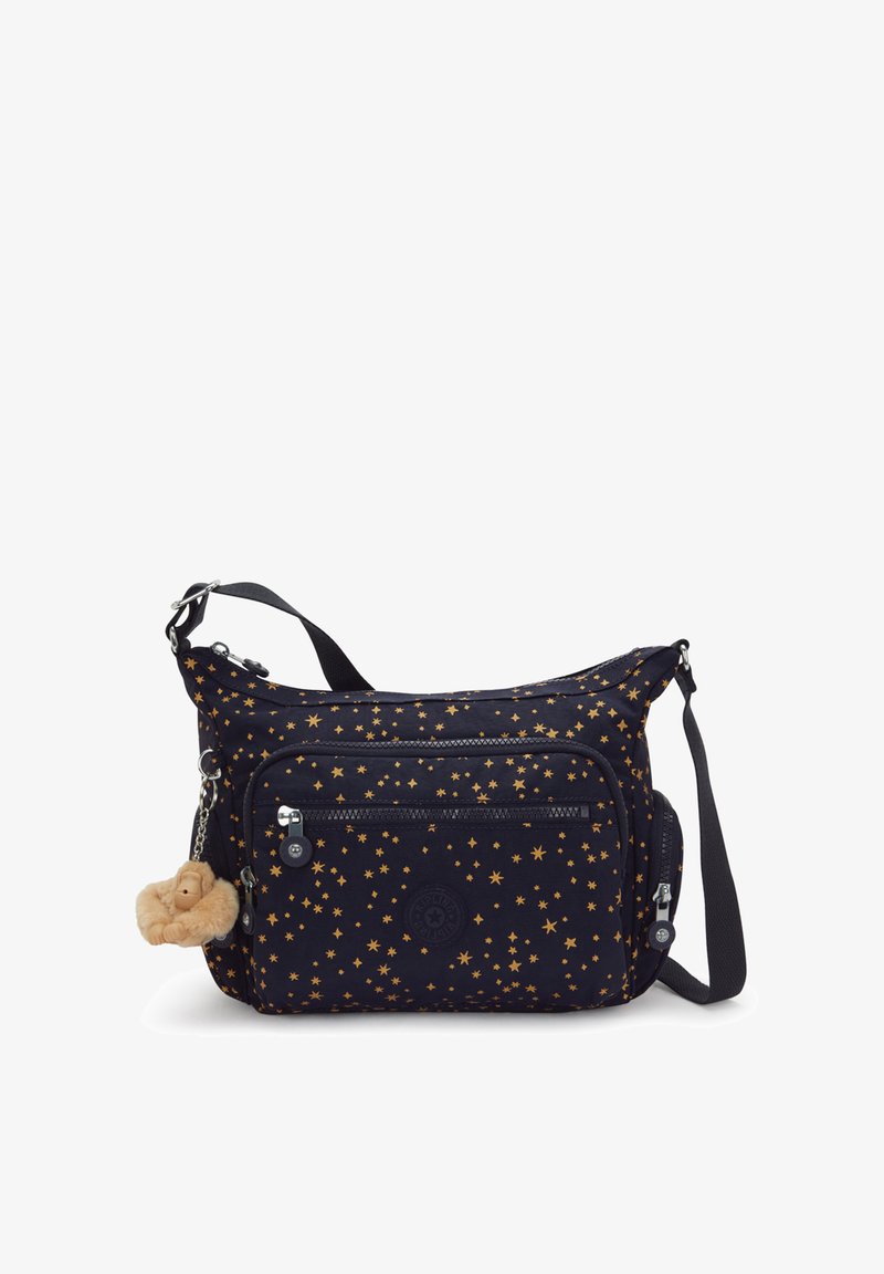 Bolso cruzado navy con estampado de estrellas doradas, compartimentos con cremallera, correa ajustable y un llavero acolchado como acento. Tela duradera.