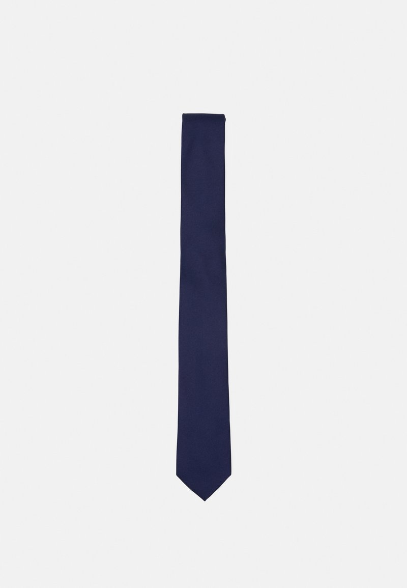 Marineblå silkebind, slank design med spiss tupp, glatt tekstur, ensfarget uten mønstre eller akenter.