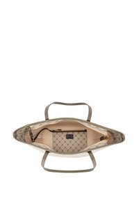 Borsa tote con un esterno beige a fantasia, manici verde oliva, un interno chiaro e una piccola pochette con zipper all'interno.