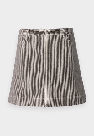 Striped denim skirt featuring a front zipper, pockets, and a flared shape, in black and white with contrasting stitching details.