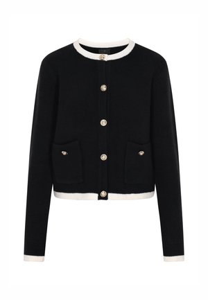 Černý pletený cardigan s kulatým výstřihem, krémovým lemem, zlatými knoflíky a dvěma předními kapsami. Má zkrácený design.