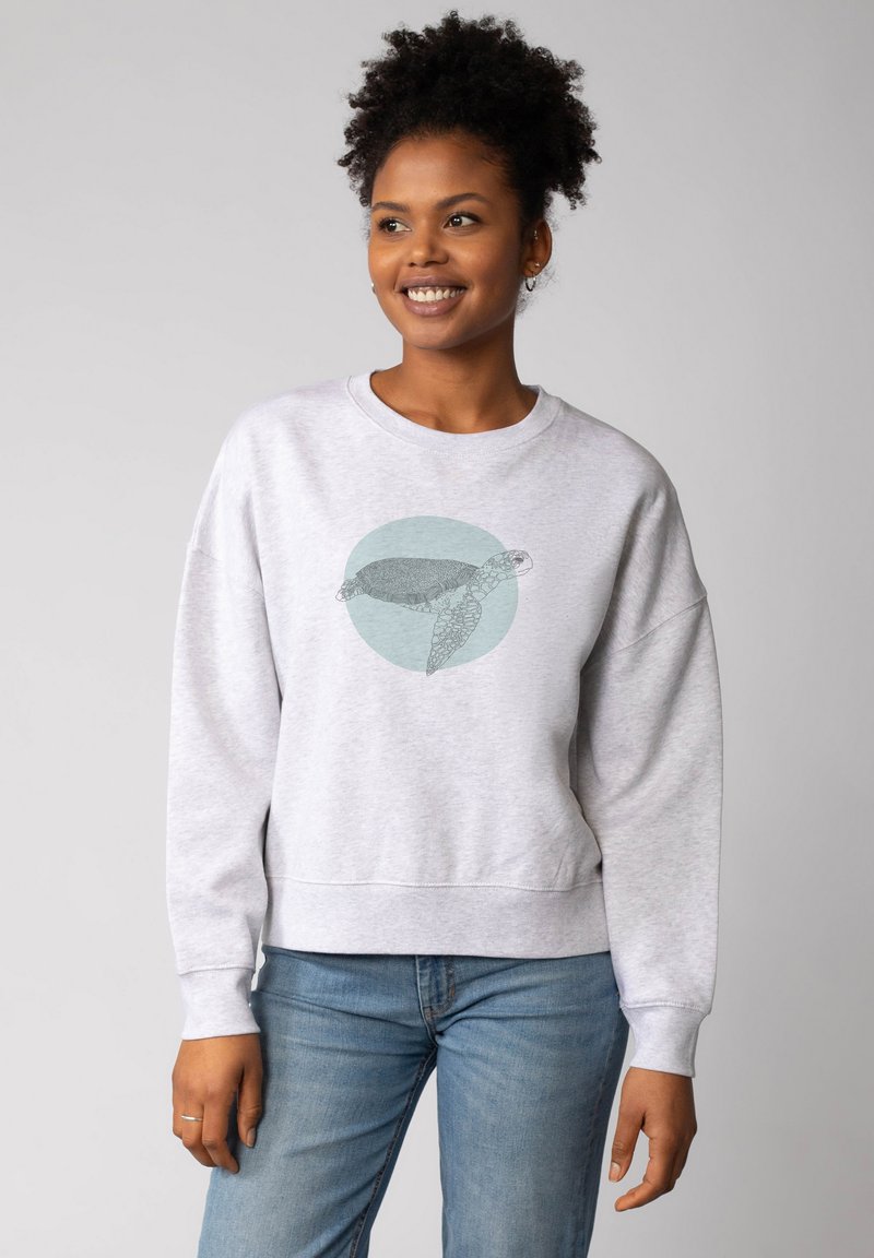 Grijze katoenen sweatshirt met een oversized fit, featuring een schildpad grafiek in zwart en teal tegen een cirkelvormige achtergrond. Casual ontwerp, geribde manchetten.