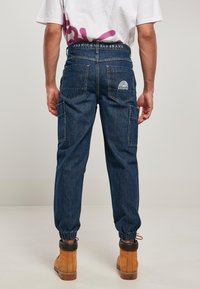 Southpole WITH CARGO POCKETS - Jeans Relaxed Fit - indigo raw