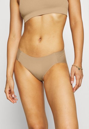 Beige bikini bottom with a smooth texture and moderate coverage. Features seamless sides and a simple design tailored for comfort.