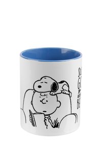 Ceramic mug with a glossy white exterior and blue interior, featuring black line art of a cartoon character with a sleeping dog and text.