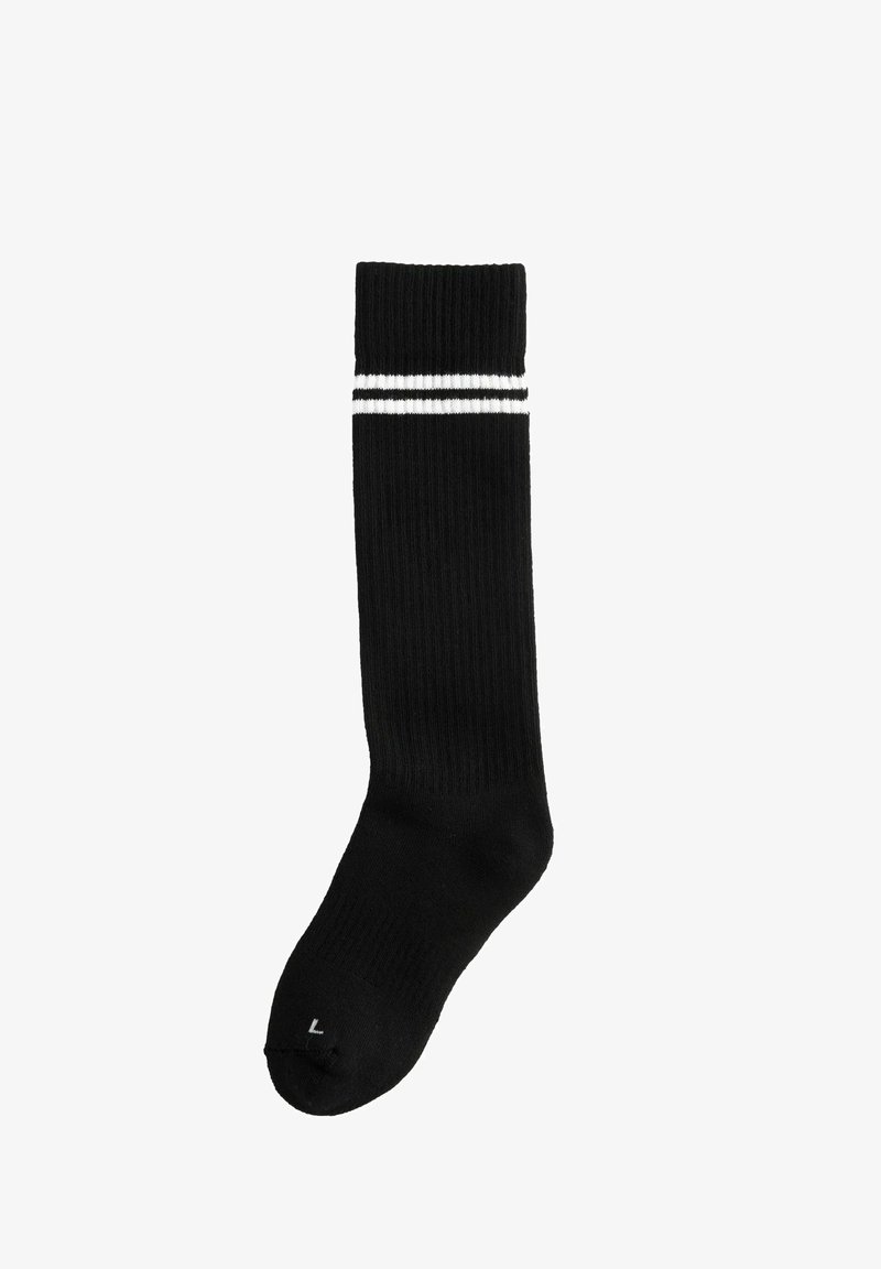 Chaussettes noires montantes avec texture côtelée, deux rayures blanches en haut et taille indiquée au niveau des orteils.