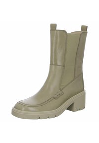 Grüne Leder-Stiefelette mit runder Zehenpartie, Blockabsatz und elastischen Seitenpaneelen. Gestickte Details und Ziehschlaufen oben für ein einfaches An- und Ausziehen.