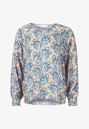 Blumenbluse aus weichem Stoff mit pinkem Grund und blauen, gelben und grünen Mustern. Mit langen Ärmeln und abgerundetem Saum.