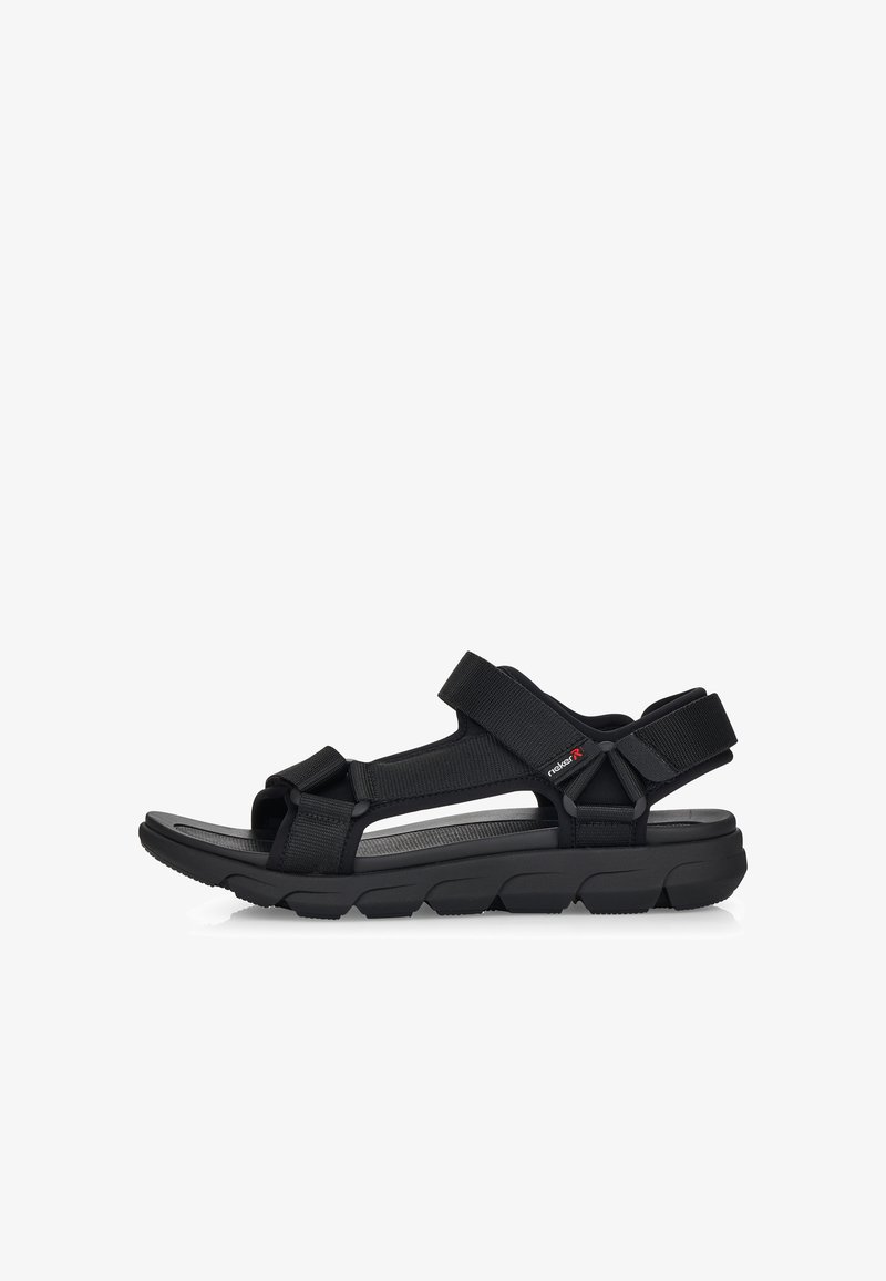 Sandales noires avec des sangles ajustables, un semelle profilée et une semelle texturée pour une meilleure adhérence. Design léger avec des côtés ouverts.