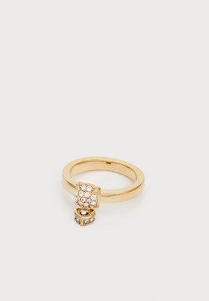Gold ring featuring a smooth band, a square top adorned with clear crystals, and a small heart-shaped charm with a crystal accent.