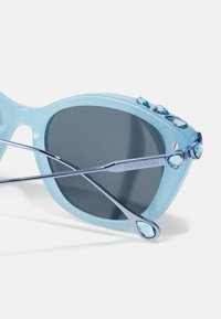 Swarovski Akiniai nuo saulės - light blue