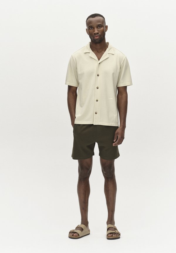 TIM WAFF - Jogginghose - rosin