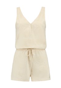 Vaalean beige romper, jossa on V-pääntie, upotettu simpukkakuosi, joustava vyötärö ja säädettävä naru. Valmistettu pehmeästä, tekstuuritetusta kankaasta.