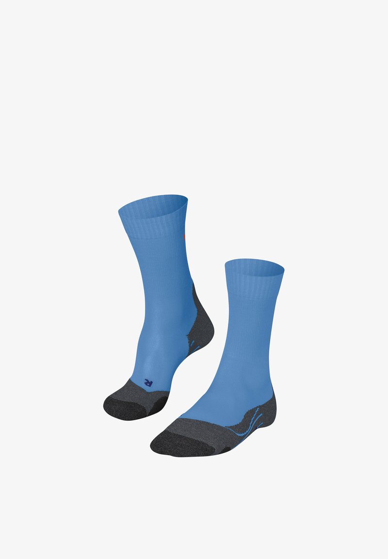 Jasnoniebieskie skarpetki z prążkowaną górną częścią, ciemnoszarym obcasem i palcami oraz gładką fakturą. Posiadają subtelny wzór akcentujący w okolicy kostki.