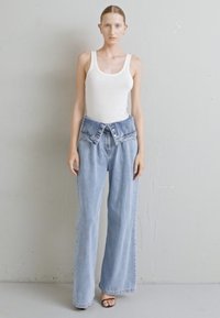 ROKH FLAP DETAILED TROUSERS - Wide leg - light blue
