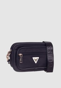 Borsa a tracolla sintetica nera con due scomparti con zip, hardware argentato, logo triangolare e tracolla regolabile con stampa del logo.