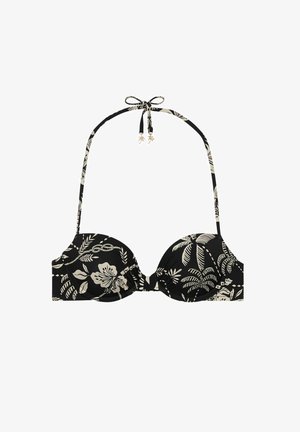 Black bikini top with floral and leaf patterns in cream, padded cups, tie neck straps, and gold accents. Matte fabric with smooth texture.