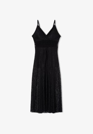 Abito in pizzo nero con spalline sottili, caratterizzato da una scollatura a V, bordo decorativo sul corpo e una gonna a strati fluttuante.