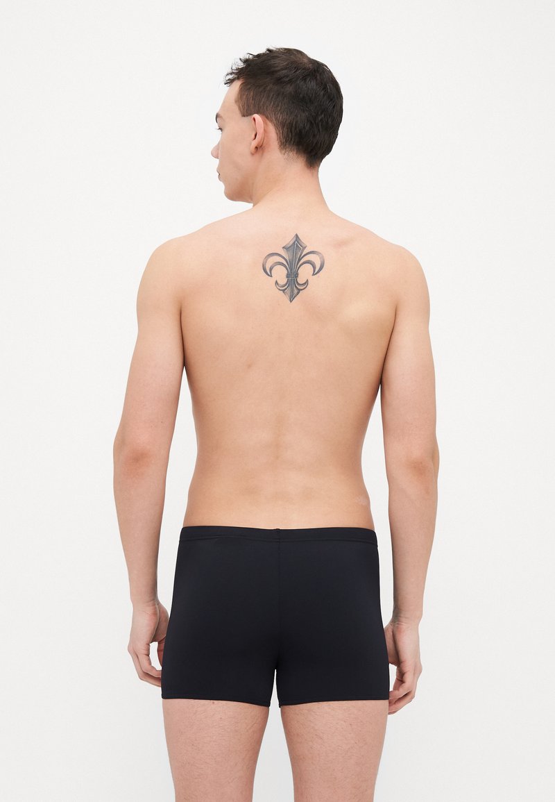 Puma SWIM MEN CLASSIC TRUNKS - Plavkové kalhotky - black