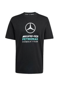 T-shirt en coton noir avec un logo Mercedes-Benz blanc et le texte turquoise "AMG PETRONAS FORMULA 1 TEAM" dans une police moderne et audacieuse.