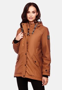 Brown waterproof parka jacket with a drawstring hood, two front pockets, snap closures, and contrasting black trim. Smooth texture and casual design.