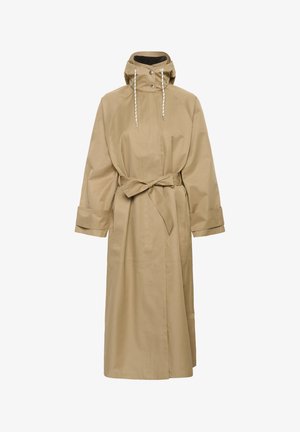 Beige long raincoat with hood, adjustable drawstring, snap buttons, wide cuffs, and a waist belt tied in a bow.