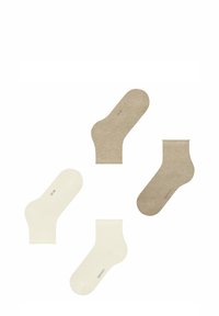Vier sokken tentoongesteld: twee in lichtbeige met een gestructureerd patroon en twee in roomkleur, beide met geribbelde boorden en gedrukte branding.