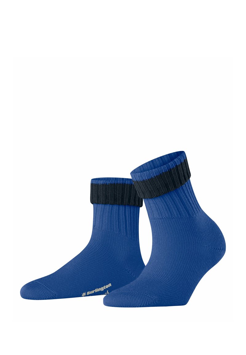 Calze blu con texture a coste e polsino nero, dotate di un'area della punta rinforzata e di un piccolo logo sul lato. Design corto alla caviglia.