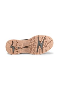 Suola della scarpa realizzata in materiale gommoso marrone chiaro con texture, dotata di un design unico, scanalature e motivi circolari per garantire aderenza.