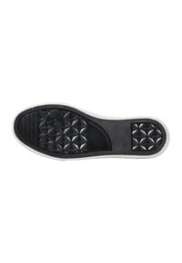 Sole di scarpa in gomma nera con una superficie decorata che presenta perni geometrici e scanalature testurizzate, incorniciata da un bordo bianco.