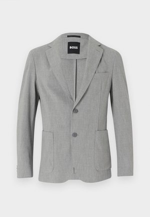 Hallitus hall blazer kahe nööbiga, lõikega kraega ja kahe ees oleva taskuga. Valmistatud tekstuuriga kangast, millel on kudumise muster.