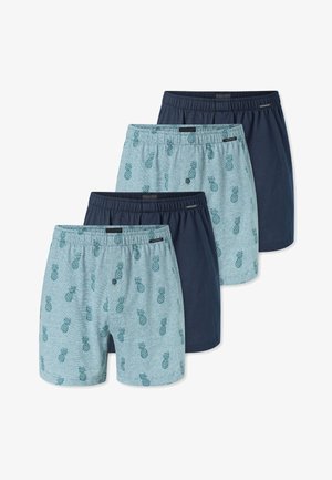 Fire herreboxershorts i vekslende ensfarvet mørkeblå og lyseblå med grønne ananasprint, arrangeret i en trappestak.