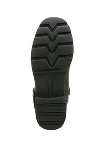 Semelle extérieure en caoutchouc noir avec un motif de semelle en zigzag. Présente une forme arrondie et une texture solide, conçue pour l'adhérence et la durabilité.