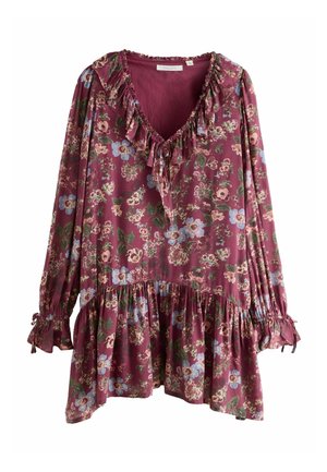 Long-sleeve maroon floral dress with ruffled V-neck, tie detail at collar, gathered waist, and elastic cuffs with small bows.