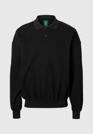 Polo a maniche lunghe nero con colletto, con una patta a due bottoni e polsini elasticizzati. Realizzata in tessuto morbido, design minimalista.