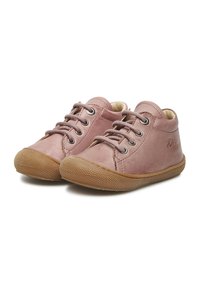 Scarpe in pelle rosa con punta arrotondata, design con lacci e suola in gomma testurizzata. Presentano dettagli cuciti e il logo del marchio sul lato.
