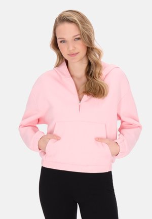 Světle růžová mikina na zip s klokankou a elastickými manžetami, vyrobená z měkké tkaniny. Stylová s kapucí pro volnočasové nošení.