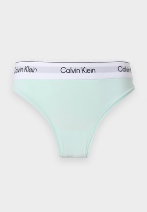 Culotte haute pour femme vert clair avec une ceinture élastique blanche ornée du logo "Calvin Klein" en noir répété.