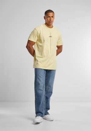 THINK DIFFERENT HEAVY - T-shirts print - softyellow