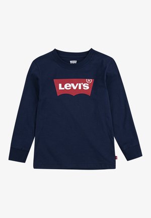 T-shirt à manches longues bleu marine en coton avec un grand logo rouge Levi's sur le devant et des poignets côtelés. Texture lisse, encolure ras du cou.