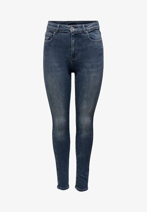 Jeans skinny de tiro alto en azul oscuro, con bolsillos frontales, cierre de botón y sutiles detalles de efecto desgastado en las piernas.