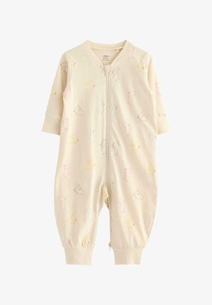 Krämfärgad onesie med frontdragkedja, prydd med pastellfärgade kaninmönster i rosa, gult och blått på mjukt, stretchigt tyg.