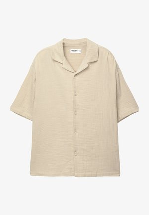 Short-sleeve button-up shirt in light beige, with a textured, crinkled fabric and a camp collar design. Features six buttons down the front.