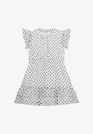 Biała sukienka w granatowe kropki, z krótkimi falbaniastymi rękawami, z przodu zapinana na guziki, z gumką w talii i warstwowym falbanym dołem. Odpowiednia do noszenia na co dzień.