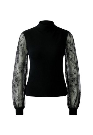 Schwarzes, figurbetontes Strickoberteil mit hohem Kragen und transparenten, langen Spitzennähten, die florale Muster und gerippte Bündchen aufweisen.