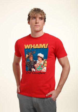 Rode katoenen T-shirt met een grafische print van twee figuren, waarvan de een een gewei draagt en de ander een kerstmanhoed, met de tekst "WHAM!" en "Last Christmas".