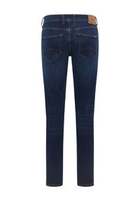 Tumed sinised denim püksid otse jalge paiste lõikega, kahe tagataskuga, millel on kaared ning heleda nahklabeliga vööl.
