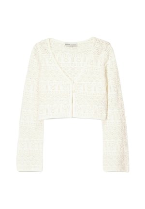 White cropped cardigan featuring a lightweight knit texture with a geometric pattern, v-neckline, and button closure at the front.