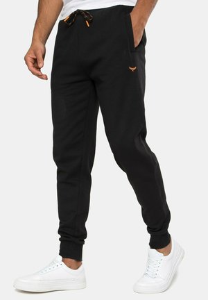 Pantalones deportivos - black