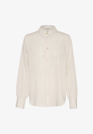 Valge nööpidega särk, millel on heledad vertikaalsed triibud, pikad varrukad nööpidega mansettidega ja klassikaline krae. Sisetaskus on brändi silt.